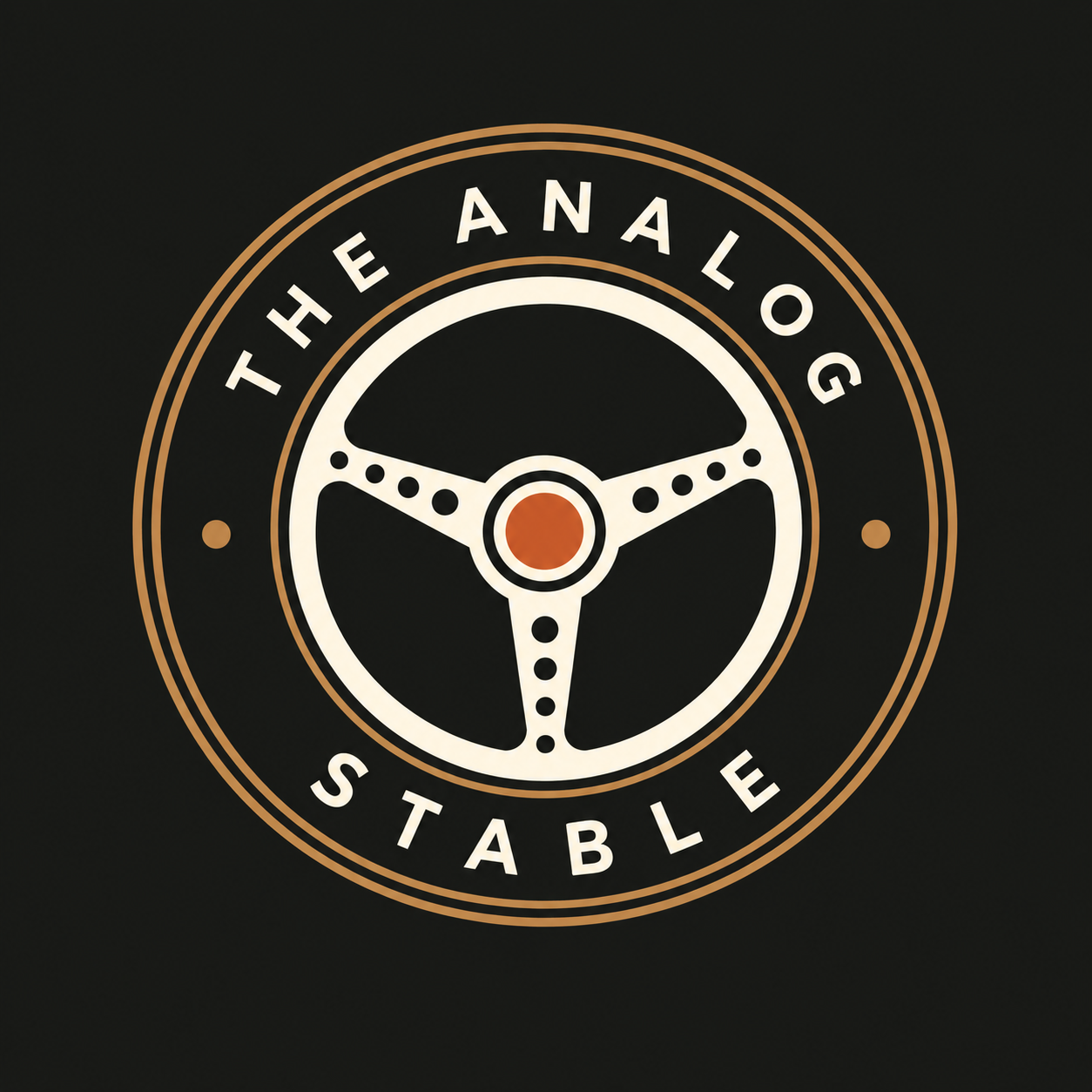 The Analog Stable — steering-wheel emblem